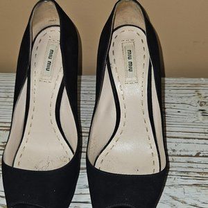 Black peep toe suede heels